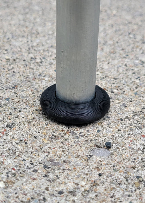 Rubber-like foot for vintage Bunting bouncing chair. 